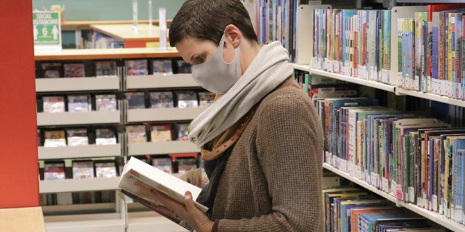 Woman browses for books in Snohomish Library