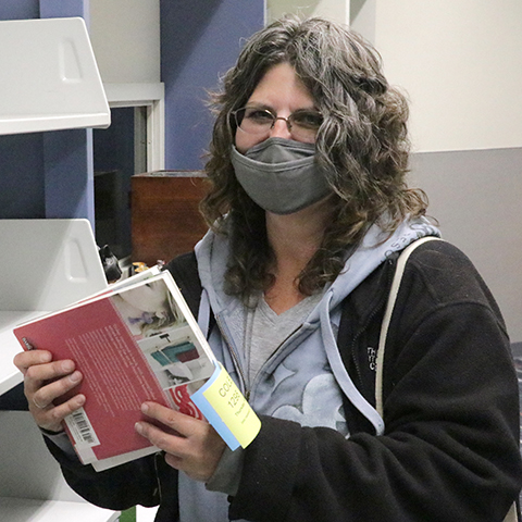 Customer Pam Cole inside Marysville Library